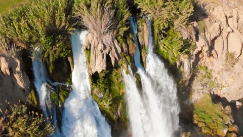 Top view of a high waterfall falling into the mediterranean sea. Clean ecology Stock-Footage 142820054