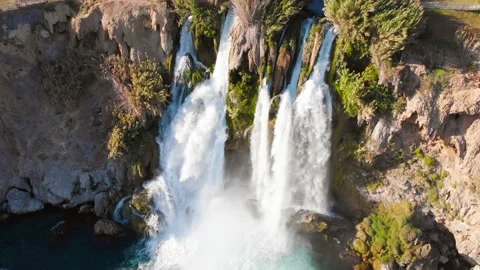 Top view of a high waterfall falling into the mediterranean sea. Clean ecology Stock-Footage 142820111