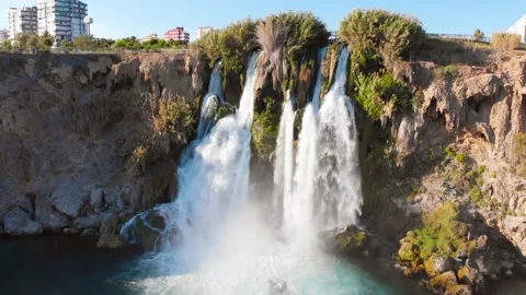 Top view of a high waterfall falling into the mediterranean sea. Clean ecology Stock-Footage 142820340