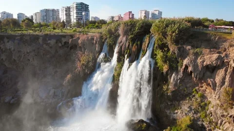 Top view of a high waterfall falling into the mediterranean sea. Clean ecology Stock-Footage 142820383