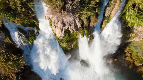 Top view of a high waterfall falling into the mediterranean sea. Clean ecology Stock-Footage 142820403