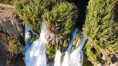 Top view of a high waterfall falling into the mediterranean sea. Clean ecology Stock-Footage 142820459