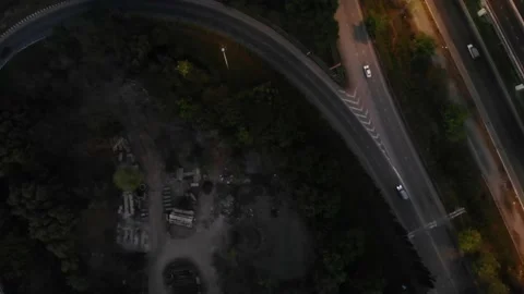 Top view of Highway road junctions at night Intersecting freeway road overpass Stock Footage 134875690