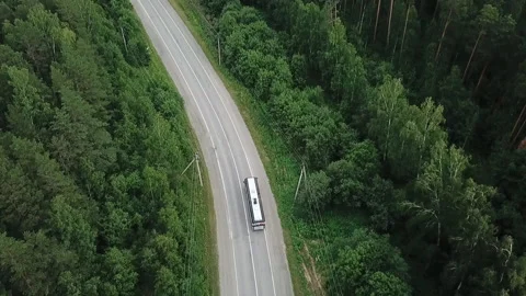Top view highway road. Road in nature forest. Media. Aerial view on a sunny Stock Footage 148104902