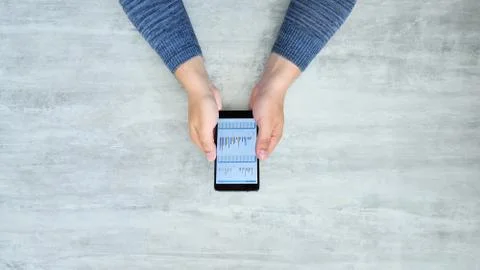 Top view of holding using smart phone Foto stock