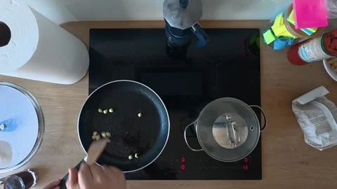 Top View of Home Kitchen Cooking on Induction Stove Stock Footage 333199933