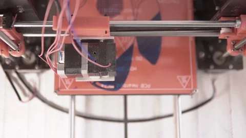 Top view of a home made 3d printer machine working on a new design of 動画素材 129719436