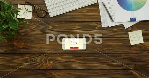 Top view on the horizontal white smartphone having a program of shopping online Stock Photos