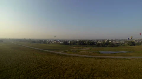 Top view of hot air balloons fly over countryside Video stock 68082017
