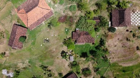 Top view of house on green fields Stock Photos