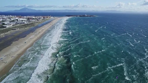 Top view on hundreds of kiters on the beach in Tarifa Stock Footage 231346166