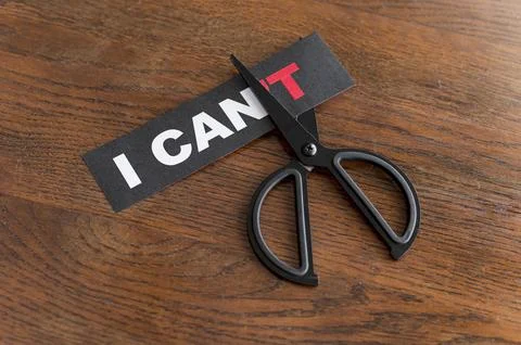 Top view i cant message card being cut with scissor High resolution photo Stock Photos