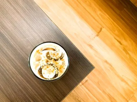 Top view of an iced coffee drink on a wooden table Stock Photos