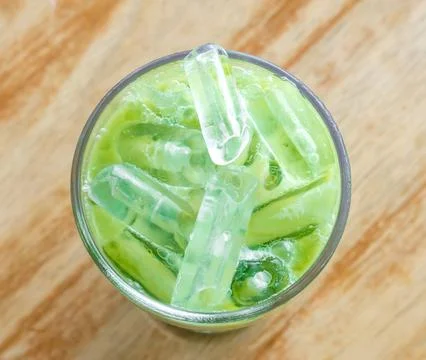 Top view of iced matcha latte or condensed milk-added green tea in transpar.. Stock Photos