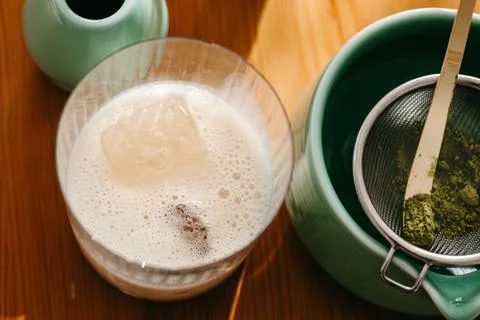 Top view of iced plant-based milk and matcha powder preparation Stock Photos