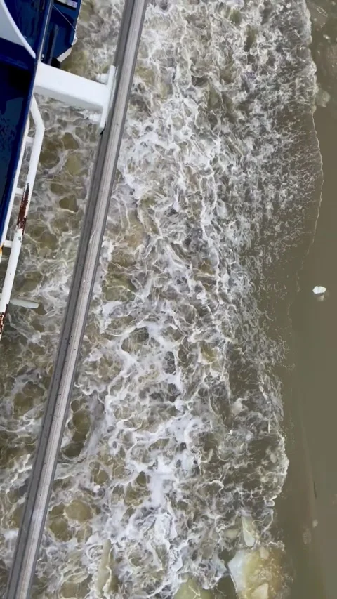 Top view on icy waves from the side of the ship sailing Stock Footage 281849995