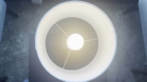 Top View of Illuminated Modern Lamp on Minimal Table Stock Footage 340106430