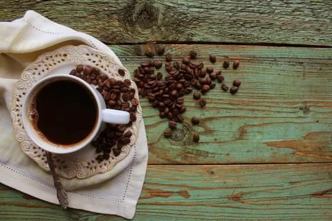 Top view image of coofee cup on rustic wooden table. vintage filtered Stock Photos