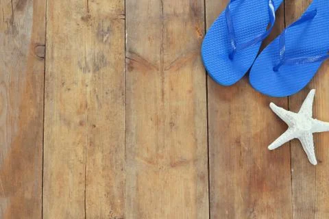Top view image of flip flops and starfish Stock Photos