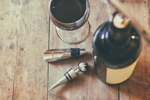 Top view image of red wine bottle and corkscrew Stock Photos