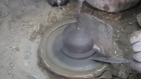 Top view of an industrial potter using a metal blade to smooth and shape Video stock 332376565