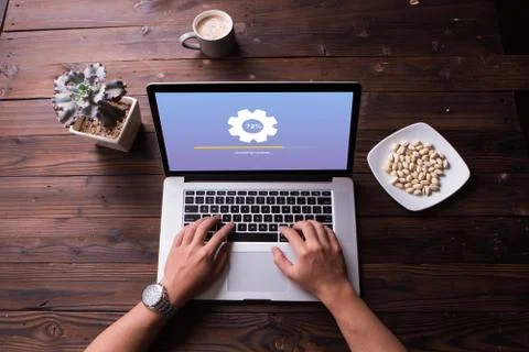 Top view of installing update process with gearbox percentage progress and loadi Stock Photos