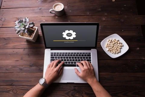 Top view of installing update process with gearbox percentage progress and loadi Stock Photos