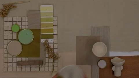 Top view of interior designer arranging base natural materials for mood board on Stock Footage 329827687