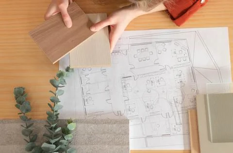 Top view of interior designer material sample moodboard on wood desk 库存照片