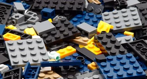 Top view of interlocking plastic LEGO construction bricks. Stock Photos