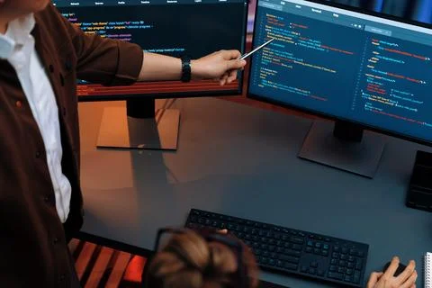 Top view IT developers discussing with point website coding system. Infobahn. Stock Photos