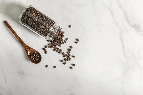 Top view jar with roasted coffee beans copy space Photos