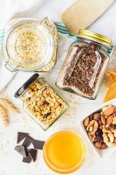 Top view of jars full of various crunchy granola  Stock Photos