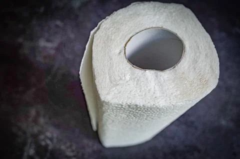 Top View of Kitchen Paper Roll Household Item on Black Surface Stock Photos