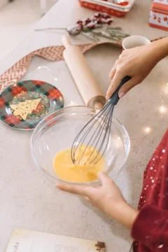 Top view of kitchen table with egg mixture into a cup Stock Photos