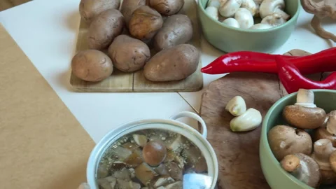 Top view of the kitchen white table with ingredients for cooking potatoes with m Видео 303010650