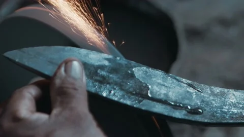 Top view of a knife sharpening operation, with sparks Stock Footage 142788606