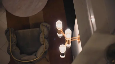 Top view of the lamp hanging on the wall in the room Stock Footage 248523086