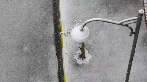 Top view of lamppost covered with snow. Video stock 171366797