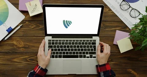 Top view on the laptop computer processing an installation of the program which 스톡 동영상 95091151