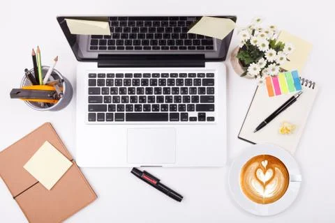 Top view laptop or notebook workspace office on white table Stock Photos