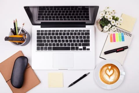 Top view laptop or notebook workspace office on white table Stock Photos