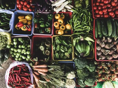 Top view on a large assortment of row loose vegetables and fruit Fotos Stock
