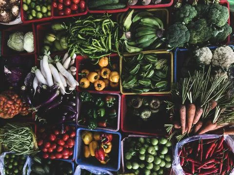 Top view on a large assortment of row loose vegetables and fruit Fotos Stock