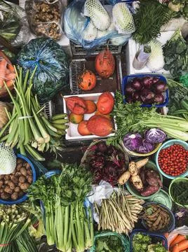 Top view on a large assortment of row loose vegetables and fruit Fotos Stock