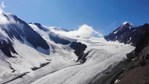 Top view of a large glacier and mountain peaks. Stock Footage 252894414