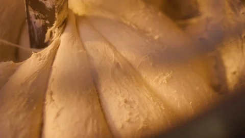Top view of large stand machine used in commercial bakery to mix bread dough. Stock Footage 123649538