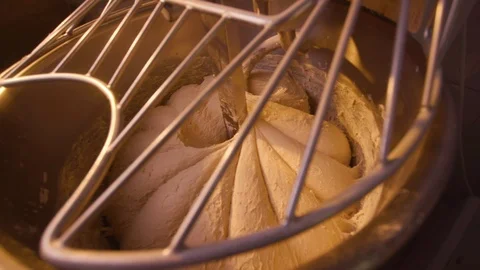 Top view of large stand machine used in commercial bakery to mix bread dough. Stock Footage 123649780