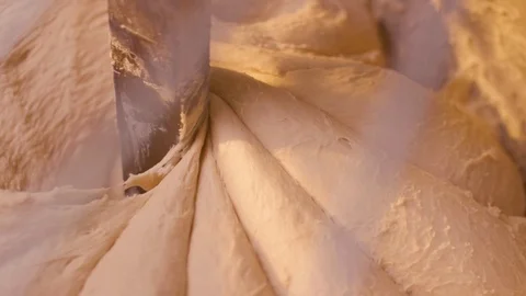 Top view of large stand machine used in commercial bakery to mix bread dough. Stock Footage 123649783