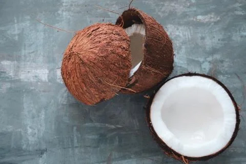 Top view layout of fresh coconuts on a gray concrete  background Stock Photos
